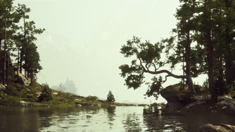 tranquil forest river scene with fog and mountains