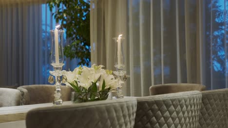 candles and flowers on the table - real estate interiors - sliding shot