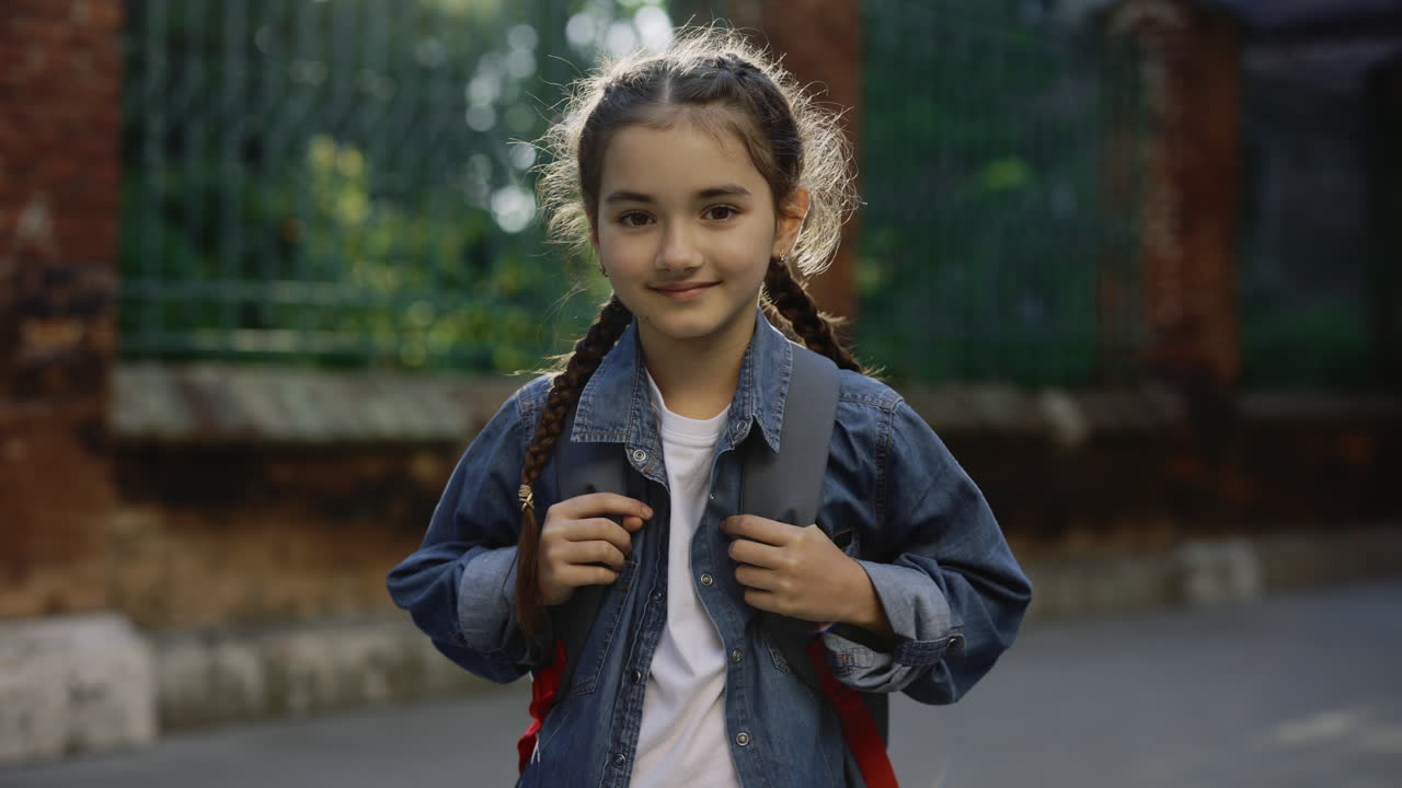 Smiling Girl with Backpack
