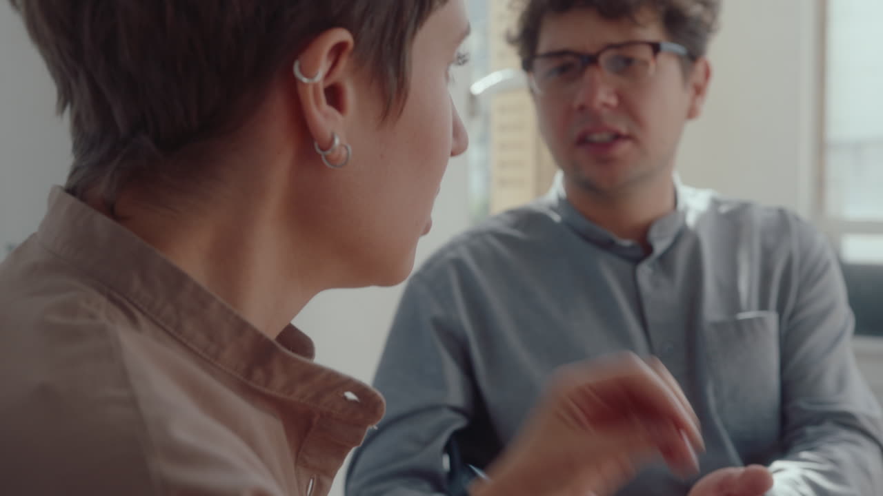 Displeased Wife and Husband Arguing on Therapy Session