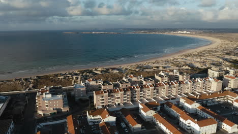Sublime-afternoon-aerial-view-of-the-bay-linking-Peniche-to-Baleal,-Portugal