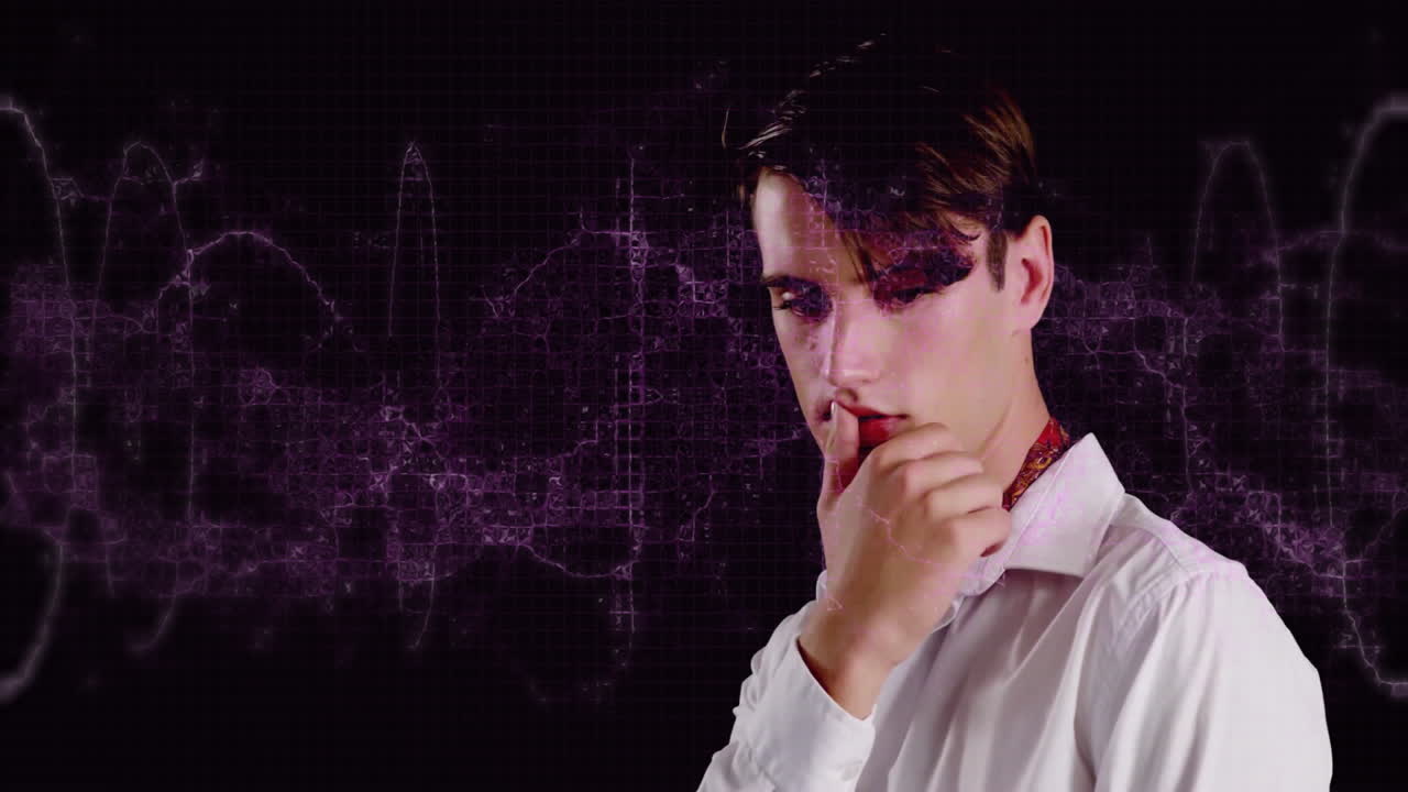 Male analyst planning technology strategy, with pulsating purple waveforms overlaying digital grid