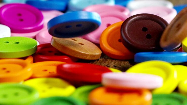 roundup of buttons colorful couture, buttons of all high-fashion colors to sew on clothing.