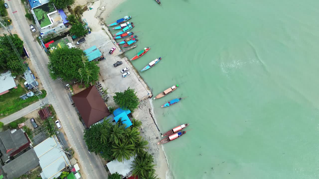 Koh Samui Pier long tail boat docks Thailand holiday destination island, aerial drone