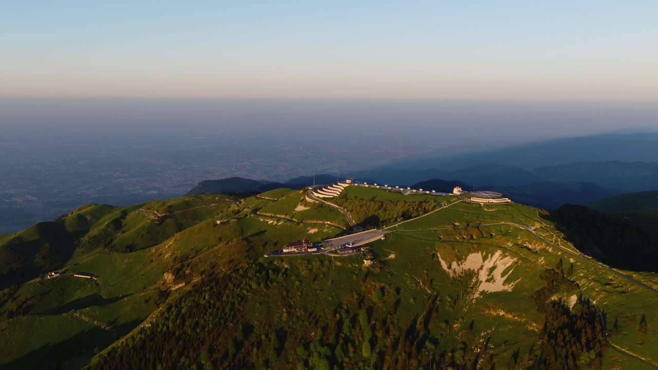 Aerial view of Sacrario Militare di Cima Grappa with vast landscape below