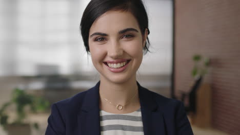 close up portrait of beautiful young business woman smiling happy enjoying start up business job opportunity in office background