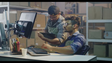 warehouse workers using computer and scanner