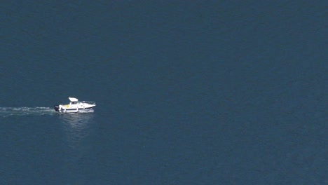 yacht navigating in the blue waters of ría de vigo, pontevedra, spain