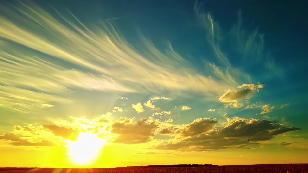 Time Lapse of Golden Sunset Over a Wheat Field