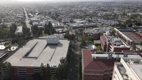 over usc campus, city of los angeles, aerial view of rooftop buildings