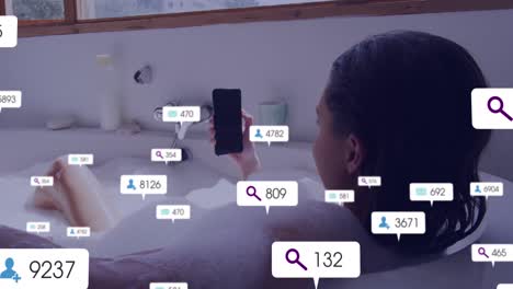 animation of notification bars over caucasian woman holding phone while lying in bathtub