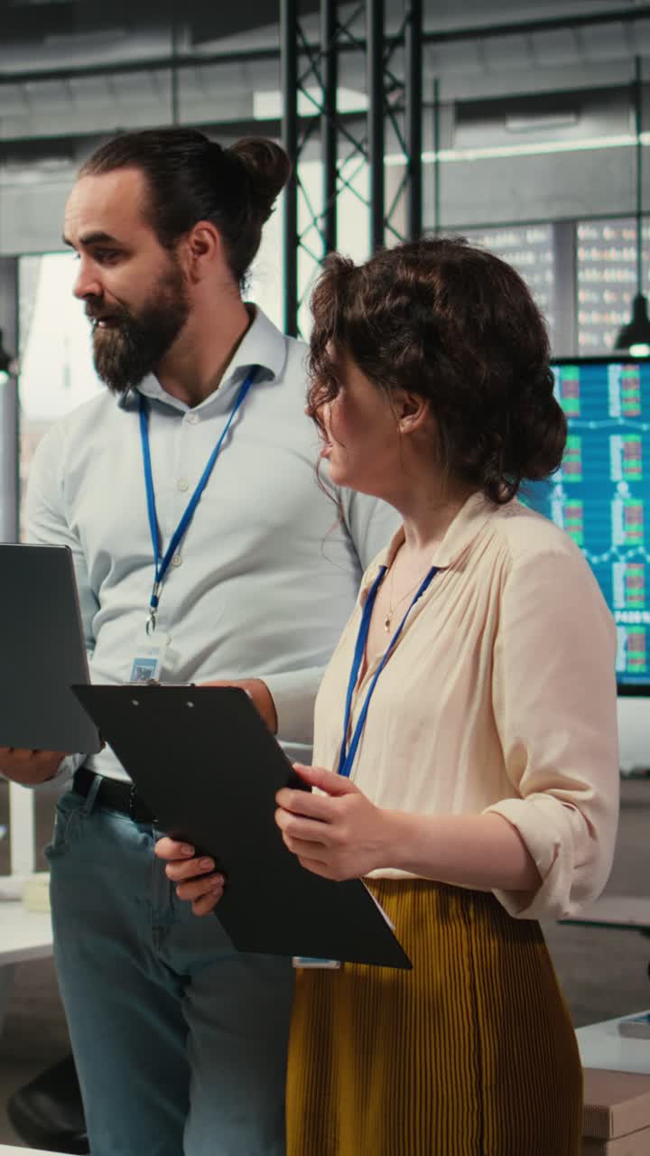 Vertical Video Diverse group of employees collaborate on project planning and analysis