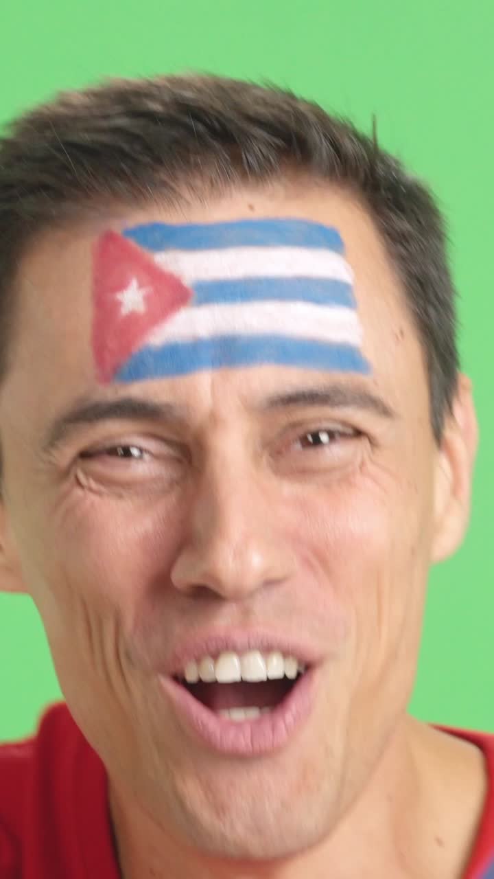 Close up of a man supporting cuban team