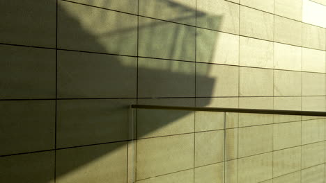 abstract building facade with shade and sunshine transitio