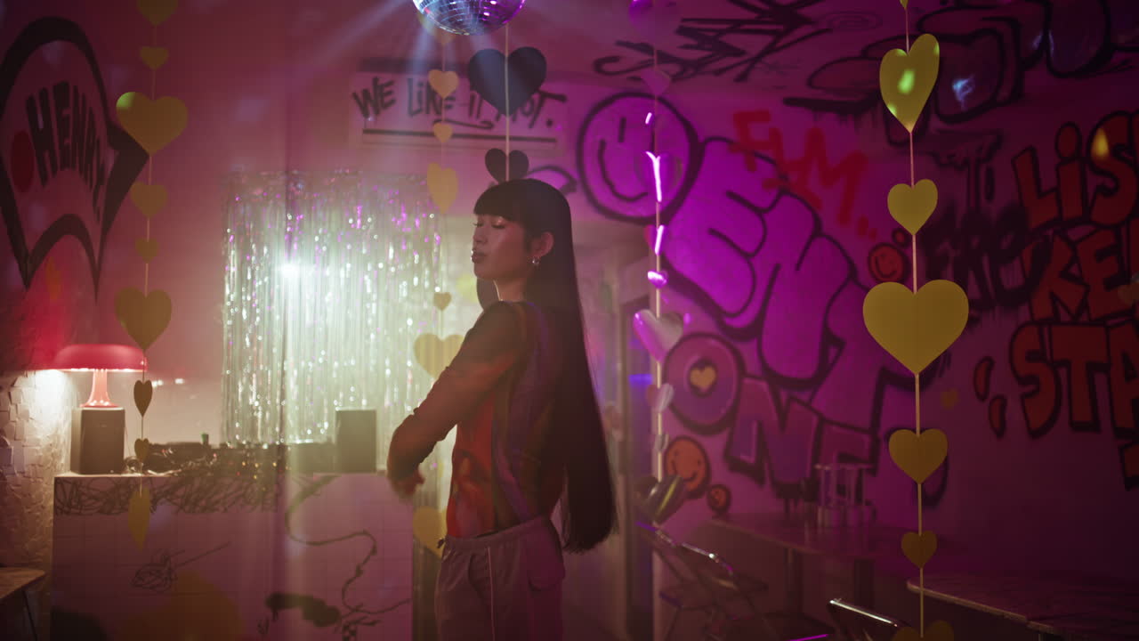 Relaxed woman dancing nightclub disco ball light. Happy clubber in club