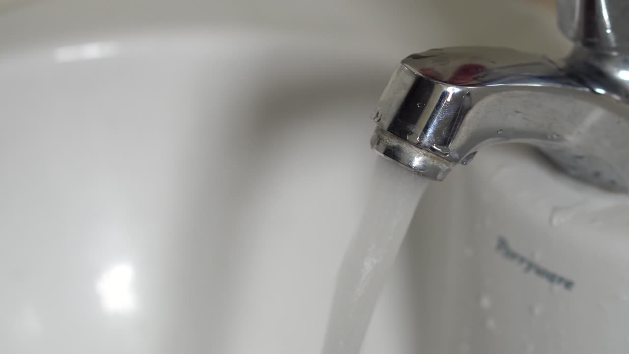 Faucet - a device with a hand-operated valve for regulating the flow of a liquid from a pipe, barrel, etc