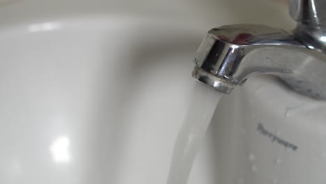 faucet - a device with a hand-operated valve for regulating the flow of a liquid from a pipe, barrel, etc