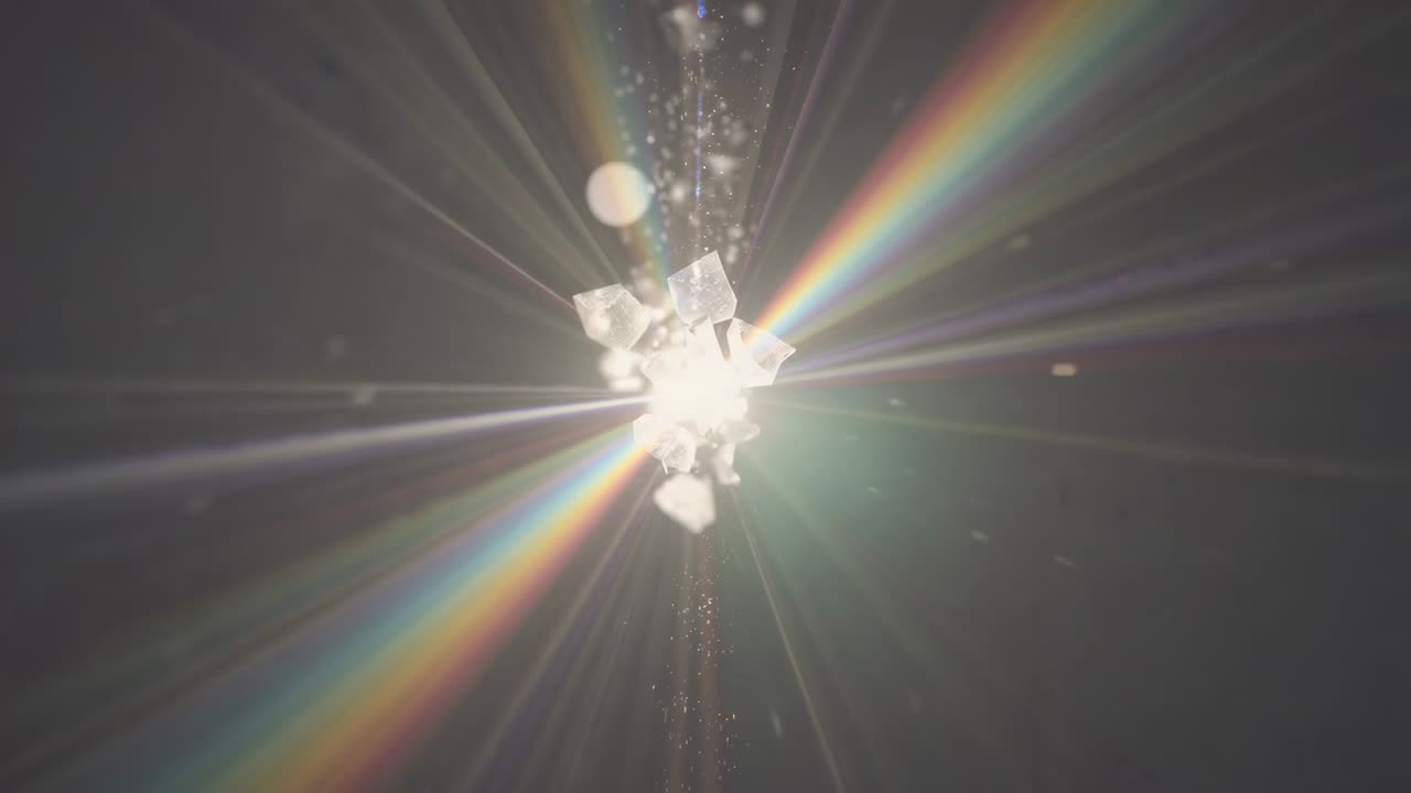 Emerging luminescent core radiating beams in dark void, forming shards and drifting microparticles