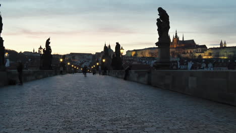 charles bridge and prague castle at twilight during corona virus pandemic