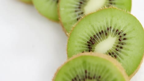 kiwi slices on white background