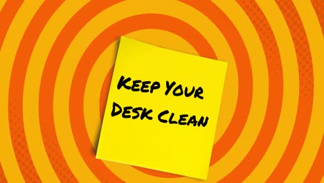 Animation-of-keep-your-desk-clean-note-over-orange-and-yellow-spinning-circles