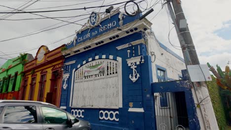 old blue building with anchors - club do remo