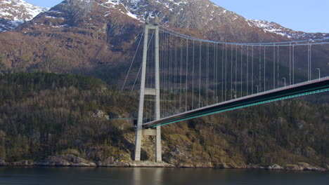 time lapse of sailing under the hardanger bridge on the eidfjorden, eldfjord