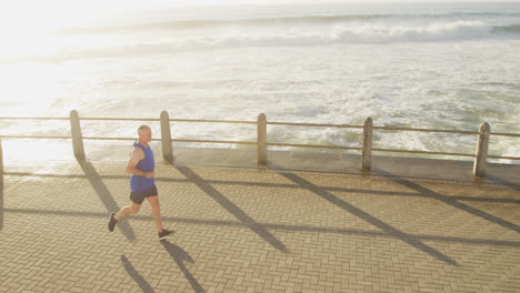 senior man running on the promenade