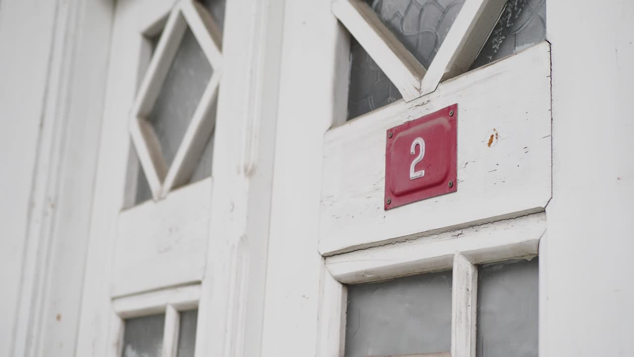 House Number 2 on a White Door