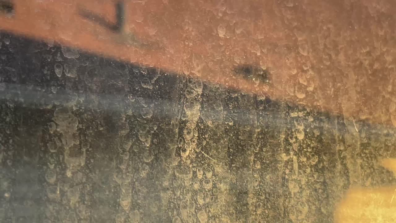 Very dirty window in house home facing another house during sunset outside - Unclean window glass
