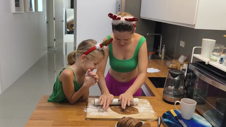 Mother and Daughter Baking Christmas Cookies