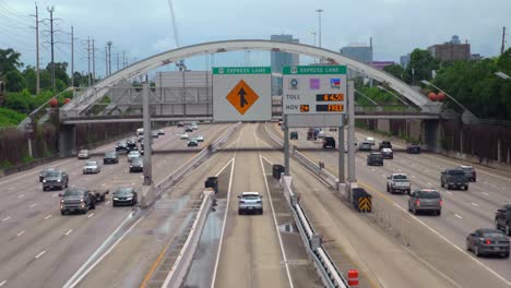 establishing shot of cars on 59 south freeway in houston