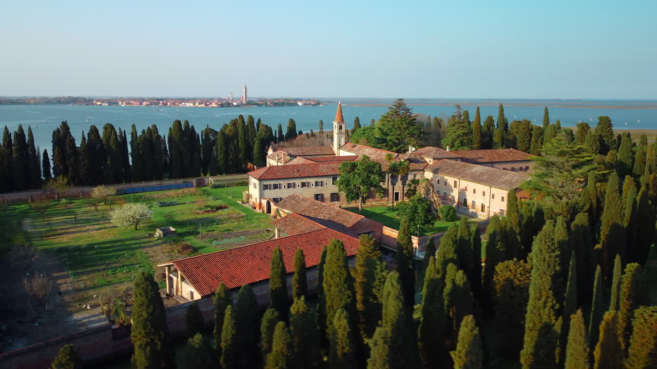 Monastery island of San Francesco del deserto in Venice. Venice lagoon seen from above with drone. San Francesco del deserto, Burano, Murano, Torcello.