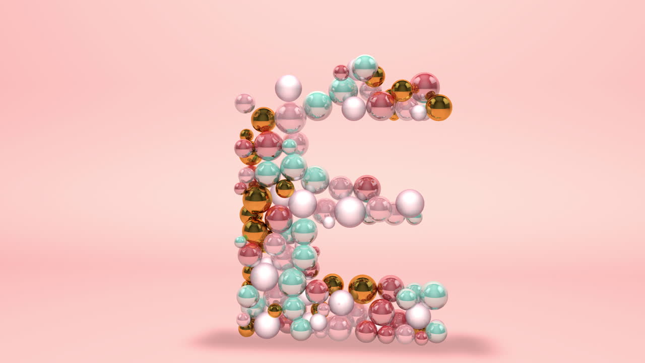 una carta hecha de cuentas, bolas de vidrio, perlas pastel, joyas de cristal y oro