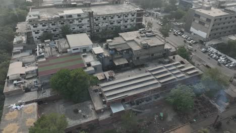Industrial-estate-at-Kot-Lakhpat,-Lahore-skyline---aerial