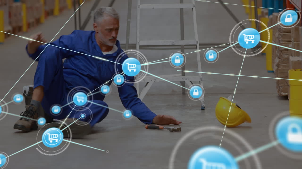 Animation of network of connections over man falling while working in warehouse