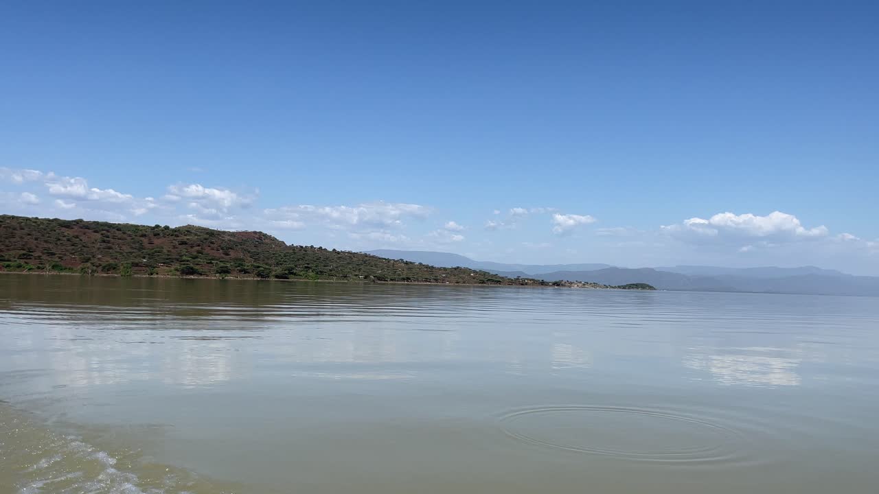 boat ride in lake Baringo with view of the shoreline