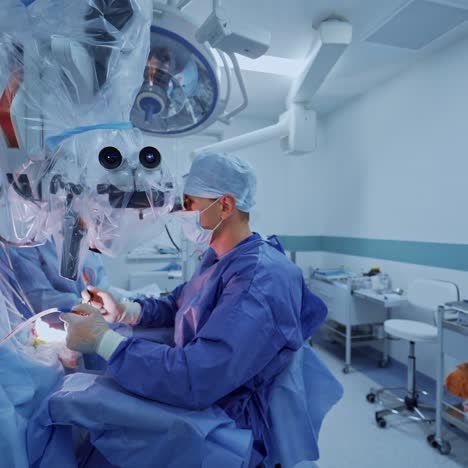 professional doctors in medical uniform making an operation. process of operation by neurosurgeons