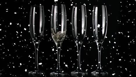 Animation-of-champagne-glasses-and-confetti-falling-on-black-background