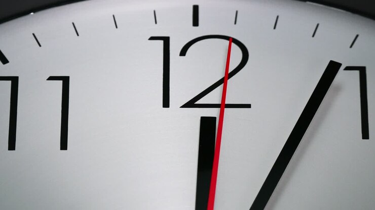 Twelve o'clock alarm clock start time 11.57 am.
