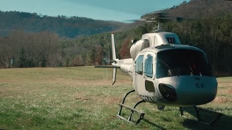 Slow-motion-dolly-shot-of-an-idling-helicopter