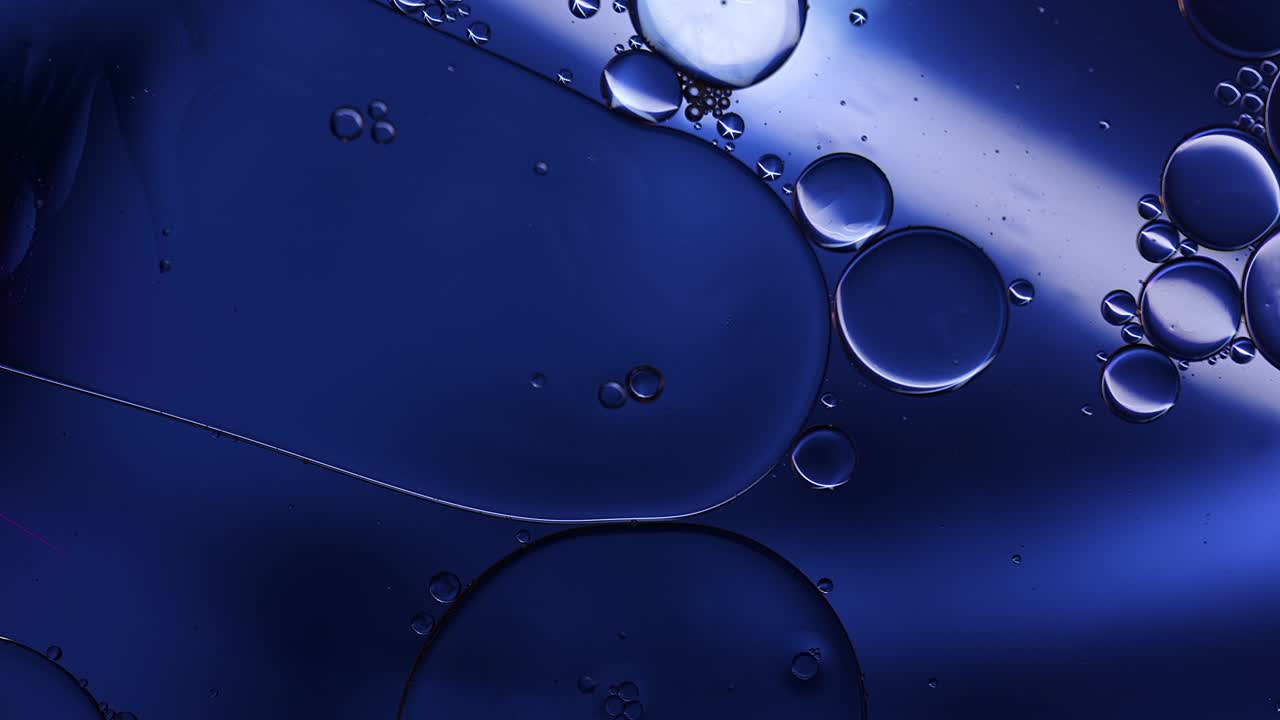 Abstract Colorful Food Oil Drops Bubbles and spheres Flowing