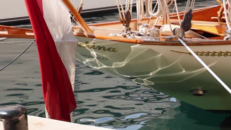 a boat reflecting on water in monte carlo