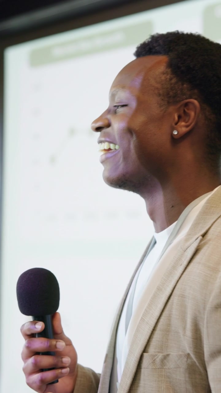 Young Professional Giving a Presentation in a Conference Room