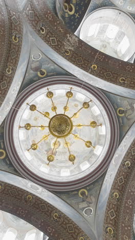 orthodox church interior with dome and frescoes