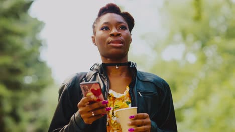 woman using smartphone in park