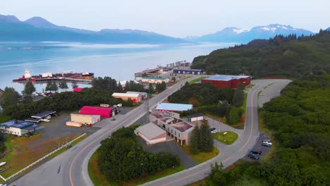 4K-Drone-Video-of-Oil-Tanker-in-Commercial-Ship-Harbor-at-Valdez,-AK-during-Sunny-Summer-Day