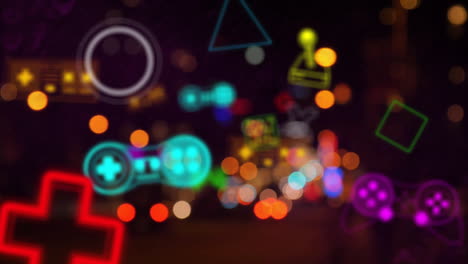 animando iconos de juegos sobre las luces borrosas de la ciudad por la noche