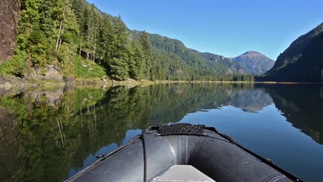 pov boat ride cruising through a glassy waters in fords terror in tracy armfords terror wilderness area southeast alaska 2