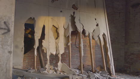 pan shot of the decaying interior of an abandoned industrial building in northeast ohio